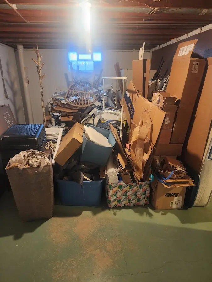 Roll-off dumpster container at job site for 15 Yard Dumpster Rental in West Point